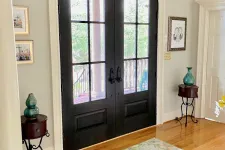 Thumbnail for Entryway with hardwood floors and arched double entry doors
