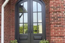 Thumbnail for Brick house with black arched double entry doors from North Georgia Replacement Windows