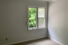 Thumbnail for a room with a window and a tree outside