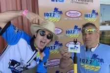 Thumbnail for a couple of men wearing hats and holding up their hands