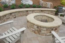 Thumbnail for a stone fireplace with chairs around it