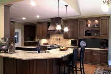 Thumbnail for a modern kitchen with stainless steel appliances and wooden cabinets