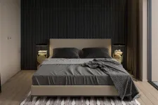 Thumbnail for a bed with a black and white striped blanket