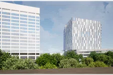 Thumbnail for Modern white office buildings behind lush green trees under a partly cloudy blue sky