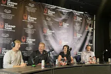 Thumbnail for Four people wearing headphones talking into microphones at a Shrimp Tank podcast panel event