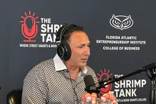 Thumbnail for Man wearing headphones speaking into a microphone on The Shrimp Tank podcast with branded backdrop.