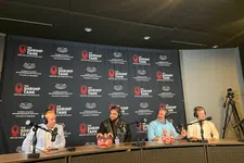 Thumbnail for Four men with microphones speak at a panel for The Shrimp Tank at Florida Atlantic University College of Business