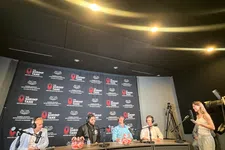 Thumbnail for Panel discussion at The Shrimp Tank event with four speakers sitting behind a desk and a woman standing with a microphone.