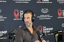 Thumbnail for Man wearing headphones speaking into microphone during The Shrimp Tank podcast at Florida Atlantic Entrepreneurship Institute