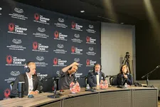 Thumbnail for Panelists wearing headphones participate in a podcast recording at The Shrimp Tank event with branded backdrop.