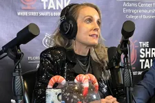 Thumbnail for Woman with headphones speaking into microphone during The Shrimp Tank podcast at Florida Atlantic University