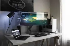Thumbnail for a desk with a computer and a monitor on it