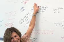 Thumbnail for a person writing on a whiteboard