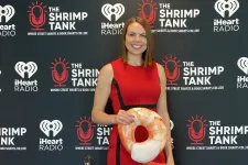 Thumbnail for Kate Volman holding a large red and white object