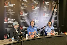 Thumbnail for Three men with microphones hosting a podcast in front of The Shrimp Tank backdrop at Florida Atlantic University.