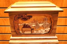 Thumbnail for a wooden box with a picture of a boat on it