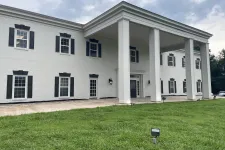 Thumbnail for a white building with columns