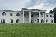 Thumbnail for a white building with columns