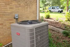 Thumbnail for Atlanta HVAC Residential Repair by The Air Company of GA.  Bryant HVAC outdoor air conditioning unit installed next to a brick house with greenery and service van in background