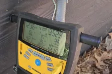 Thumbnail for Fieldpiece digital manifold gauge connected to HVAC system with Cool Air Mechanical label on wall.