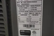 Thumbnail for Lennox HVAC unit label with model and serial numbers, pressure ratings, electrical specs, and certification details.