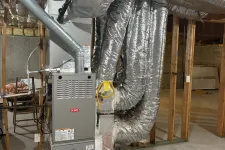Thumbnail for Bryant HVAC furnace system with insulated ductwork installed in an unfinished basement