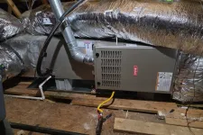 Thumbnail for Residential HVAC system with ductwork, furnace, and ventilation components installed in an attic space.