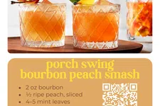 Thumbnail for Two bourbon peach smash cocktails in diamond-cut glasses garnished with peach slices and mint leaves.