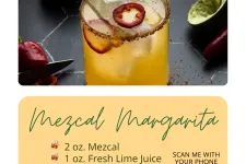Thumbnail for Mezcal margarita cocktail with chili garnish, ice cubes, and Tajín-rimmed glass on dark surface.