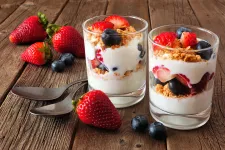 Thumbnail for two glasses of dessert with strawberries and a spoon