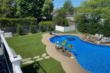 Thumbnail for a backyard with a pool and a fence
