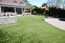 Thumbnail for a large green lawn in front of a house
