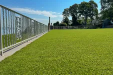 Thumbnail for a fenced in area with a white wall and a white wall