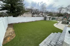 Thumbnail for a backyard with a fence and a white fence