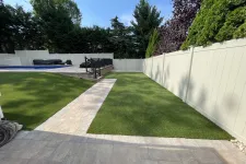 Thumbnail for a backyard with a fence and a lawn