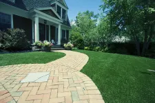 Thumbnail for a brick walkway leading to a house