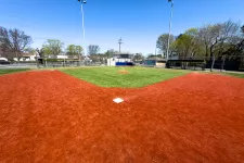 Thumbnail for a field with a red dirt field