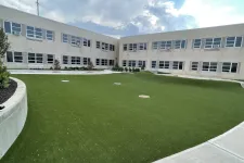 Thumbnail for a building with a green lawn