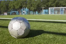 Thumbnail for a football ball on the grass