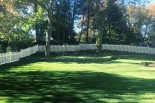 Thumbnail for a fenced in yard with trees