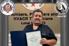 Thumbnail for a person holding a certificate
