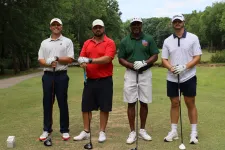 Thumbnail for a group of men on a golf course