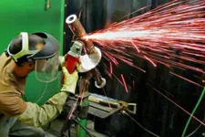 Thumbnail for a person fixing a machine