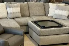 Thumbnail for a couch with a laptop on it