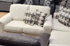 Thumbnail for a couch with a white and black cushion