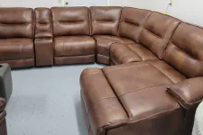 Thumbnail for a brown leather couch