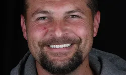 Thumbnail control image for a man smiling for the camera
