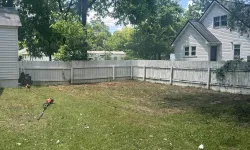 Thumbnail control image for a yard with a fence and trees