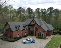 a car parked in front of a house