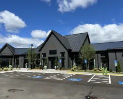 a building with a parking lot